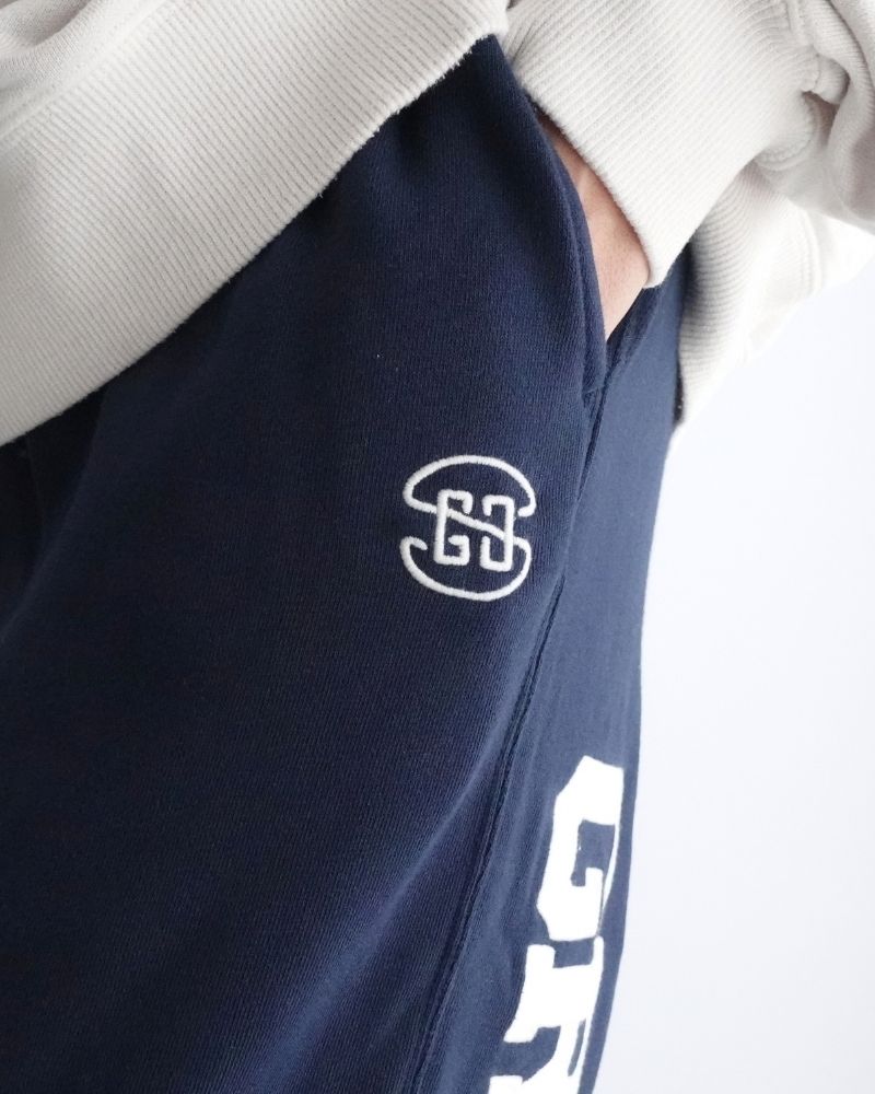 ウラケ GRVYCLRS アップリケ ロングパンツ (MENS) Navy