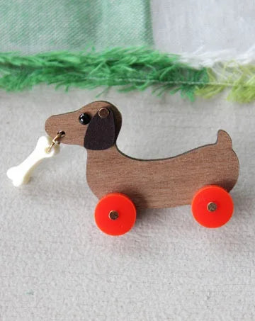 DOG ON WHEELS BROOCH